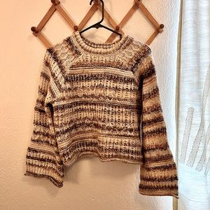Cropped cable knit sweater